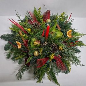 Round Festive Arrangement with Red Candle