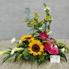 Arrangement with various beautiful flowers and greenery