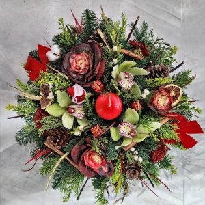 Round Festive Arrangement with Big Red Candle