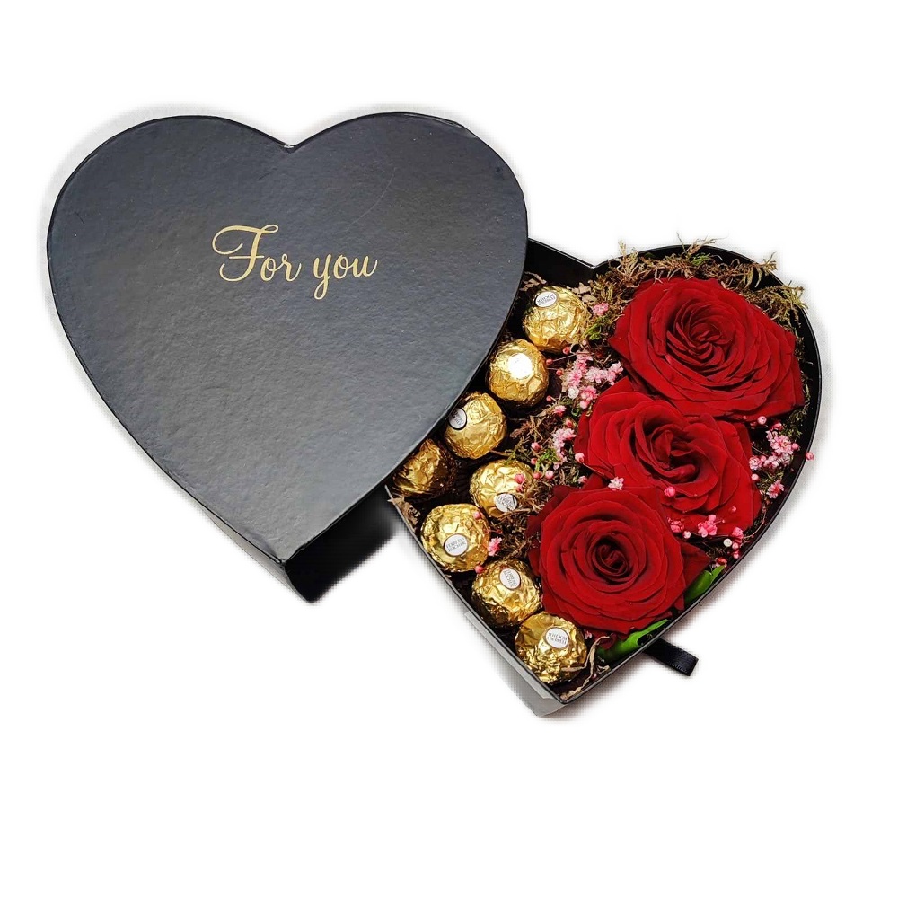 valentines gift with roses and ferrero rocher heart black box